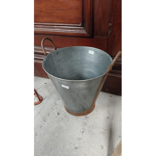 287 - Two Handled aluminium and metal bucket. {47 cm H x 40 cm Dia.}.