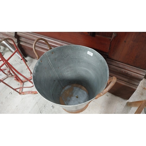 287 - Two Handled aluminium and metal bucket. {47 cm H x 40 cm Dia.}.