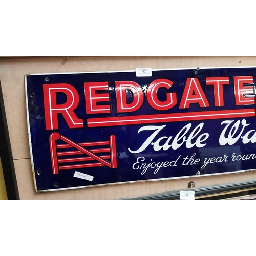 42 - Redgate Table Waters enamel advertising sign. {28 cm H x 81 cm W}.