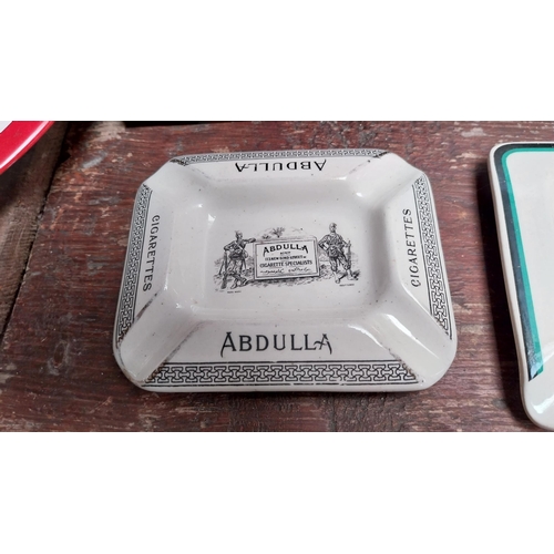 66 - Abdulla cigarettes ceramic ashtray. {12 cm H x 10 cm W}.