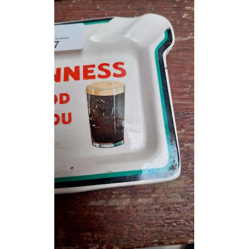 67 - Guinness is Good for You ceramic advertising ashtray. {12 cm H x 15 cm W}.