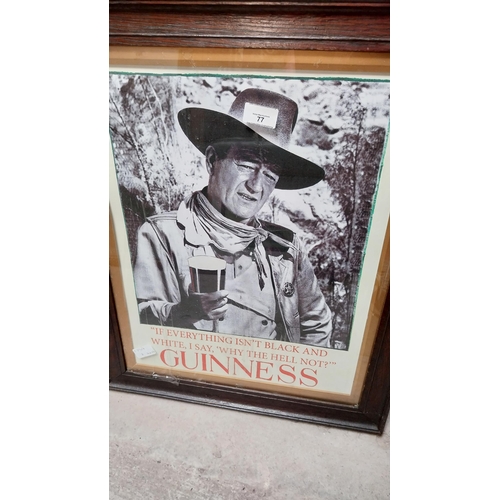 77 - Guinness John Wayne black and white framed print. {60 cm H x 49 cm W}.