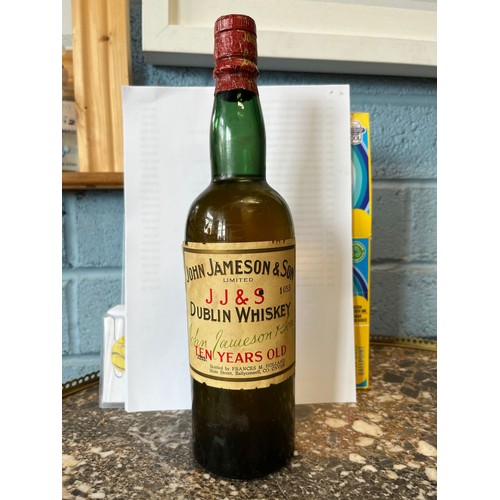 80A - Bottle of John Jameson & Son Dublin whiskey bottled by Frances M Holland, Main Street, Ballyconnell,... 