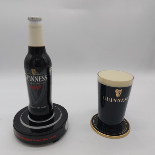 1260A - Two Guinness Perspex counter fonts in the form of a Guinness Bottle { 28cm H X 15cm Dia  }  and Guin... 