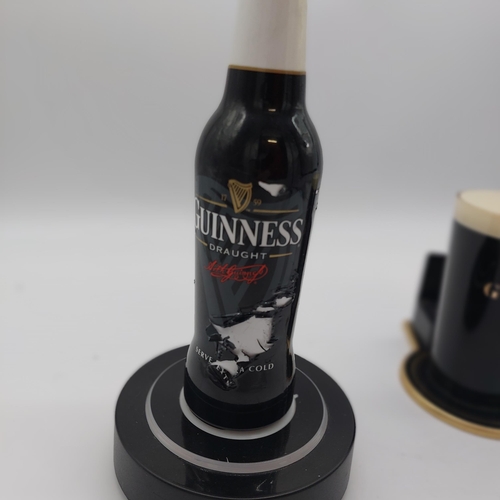 1260A - Two Guinness Perspex counter fonts in the form of a Guinness Bottle { 28cm H X 15cm Dia  }  and Guin... 