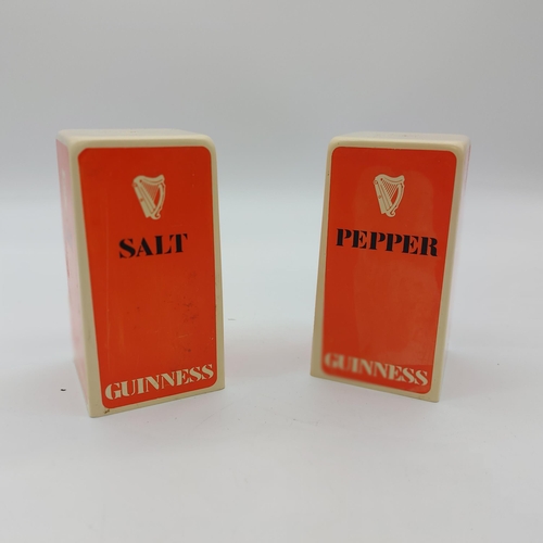 1267 - Guinness Perspex cruet set - Salt & Pepper  { 13cm H X 7cm W X 7cm D }.