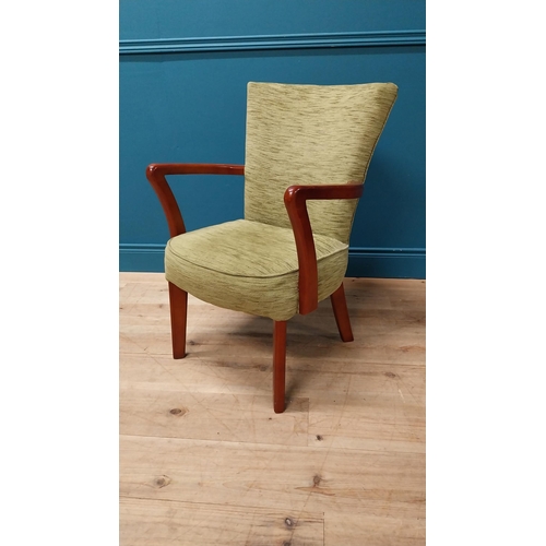 102 - 1950s mahogany and upholstered armchair raised on square tapered legs {84 cm H x 56 cm W x 50 cm D}.