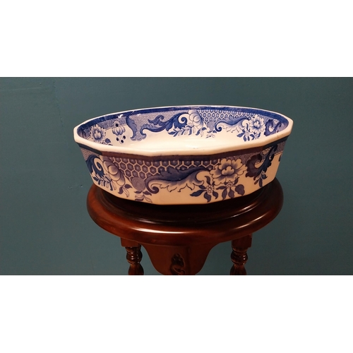 105 - Early 20th C. blue and white willow pattern Ironstone bowl {8 cm H x 29 cm Dia.}.