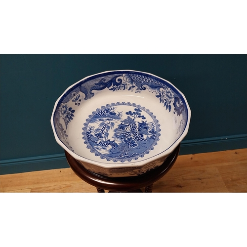 105 - Early 20th C. blue and white willow pattern Ironstone bowl {8 cm H x 29 cm Dia.}.