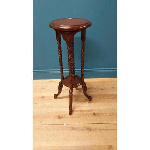 106 - Good quality mahogany jardini�re stand raised on barley twist columns and four outswept feet {78 cm ... 