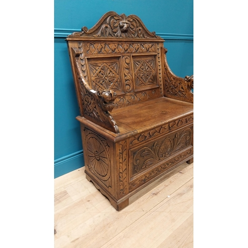 111 - Good quality Victorian carved oak monks bench decorated with lions masks {110 cm H x 91 cm W x 43 cm... 