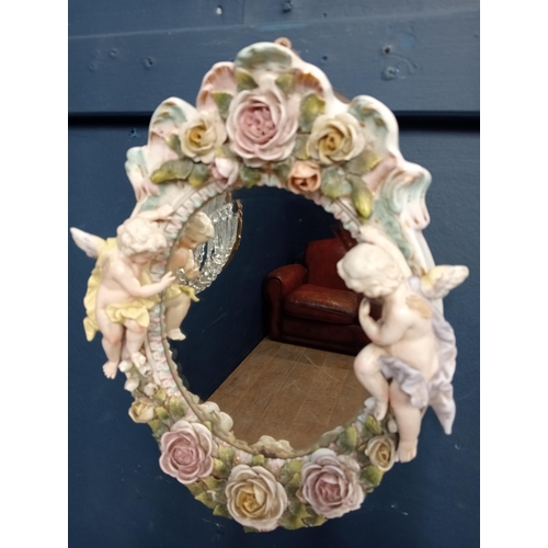 113 - Capodimonte oval wall mirror {H 45cm x W 31cm }.