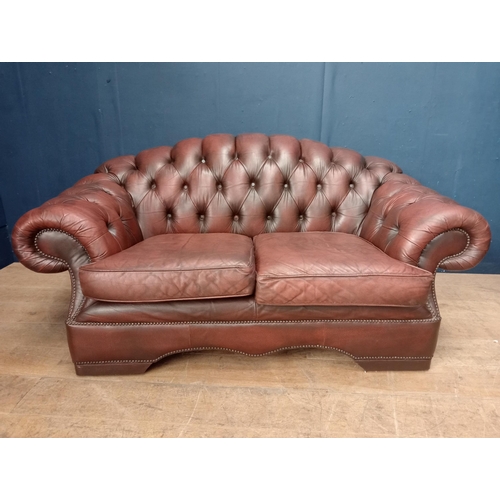 133 - Brown leather deep buttoned two seater sofa  {H 80cm x W 160cm x D 80cm }.