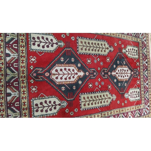 142 - Decorative Persian carpet square {243 cm L x 157 cm W }.