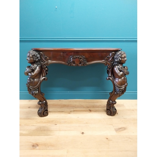 147 - Good quality Italian Victorian mahogany and carved pine console table decorated with cherubs raised ... 