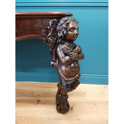 147 - Good quality Italian Victorian mahogany and carved pine console table decorated with cherubs raised ... 