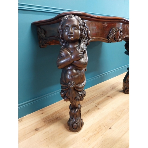 147 - Good quality Italian Victorian mahogany and carved pine console table decorated with cherubs raised ... 