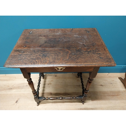 181 - 19th C. oak side table with single drawer raised on turned legs {72 cm H x 73 cm W x 52 cm D}.