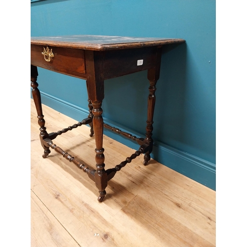 181 - 19th C. oak side table with single drawer raised on turned legs {72 cm H x 73 cm W x 52 cm D}.