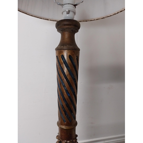 186 - Italian gilt and painted pine table lamp with cloth shade {102 cm H x 40 cm Dia.}.