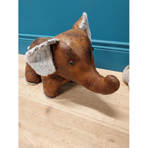 191 - Two leather door stops in the form of Cow and Elephant {36 cm H x 38 cm W x 20 cm D and 27 cm H x 47... 