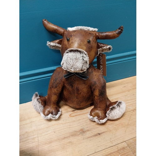 191 - Two leather door stops in the form of Cow and Elephant {36 cm H x 38 cm W x 20 cm D and 27 cm H x 47... 