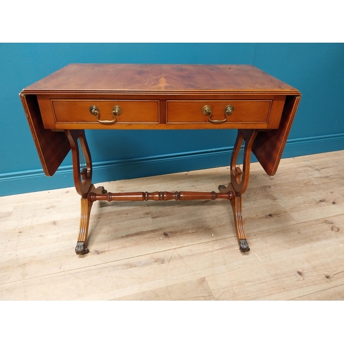 192 - Good quality yew wood library table with two drawers in the frieze raised on lyre supports and brass... 