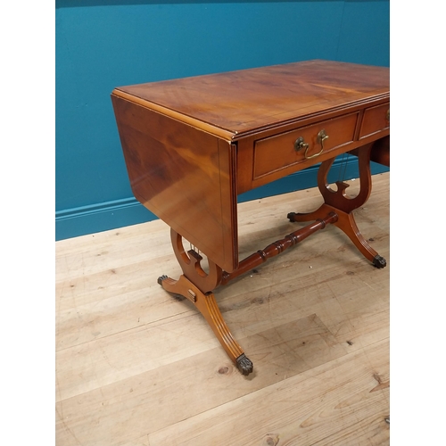 192 - Good quality yew wood library table with two drawers in the frieze raised on lyre supports and brass... 