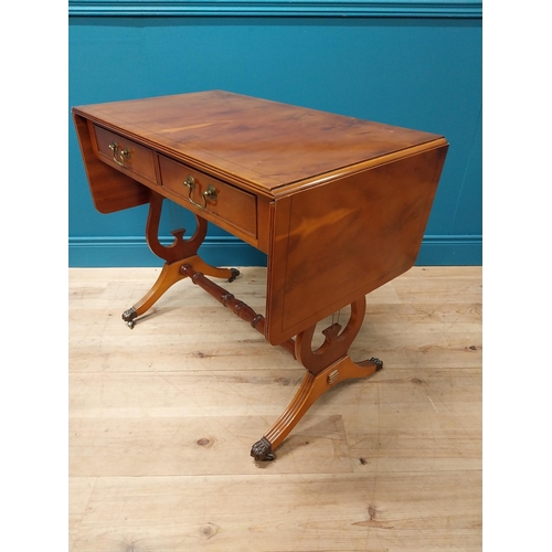 192 - Good quality yew wood library table with two drawers in the frieze raised on lyre supports and brass... 