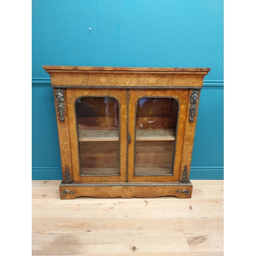 197 - Good quality 19th C. French burr walnut and inlaid side cabinet with ormolu mounts and two glazed do... 