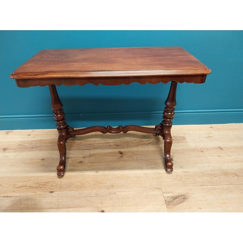 207 - Good quality 19th C. mahogany side table raised on turned legs, single stretcher and four outswept f... 