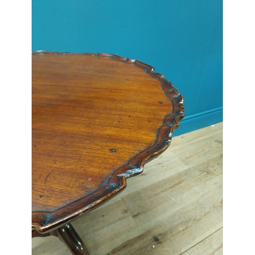 210 - Irish Georgian mahogany pie crust centre table raised on turn column and three outswept feet {72 cm ... 