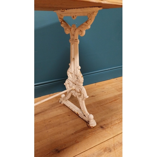 22 - 19th C. decorative cast iron table with mahogany top {75 cm H x 96 cm W x 50 cm D}.