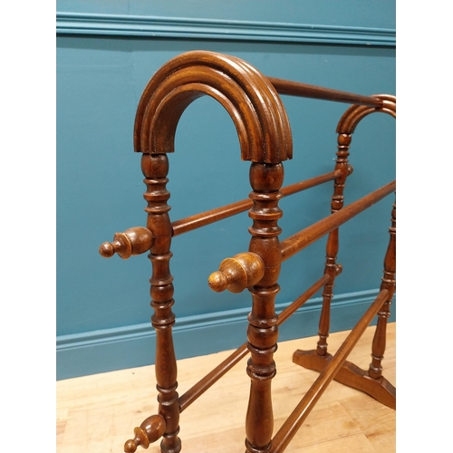 220 - Edwardian oak towel rail raised on turned column and platform feet {82 cm H x 80 cm W x 34 cm D}.