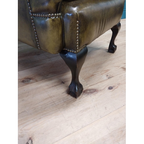 227 - Good quality hand died deep buttoned leather wingback arm chair in the Georgian style {123 cm H x 82... 