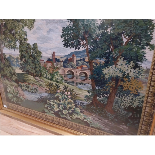 236 - 20th C. tapestry woodland scene mounted in gilt frame {199 cm H x 134 cm W}.