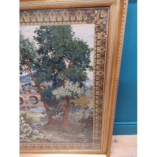 236 - 20th C. tapestry woodland scene mounted in gilt frame {199 cm H x 134 cm W}.