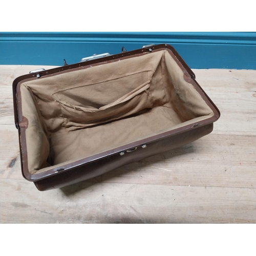 242 - Early 20th C. leather gladstone bag {26 cm H x 47 cm W x 16 cm D}.