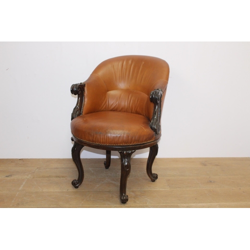 243 - Leather upholstered mahogany swivel tub chair raised on cabriole legs  {H 86cm x W 56cm x D 77cm }.