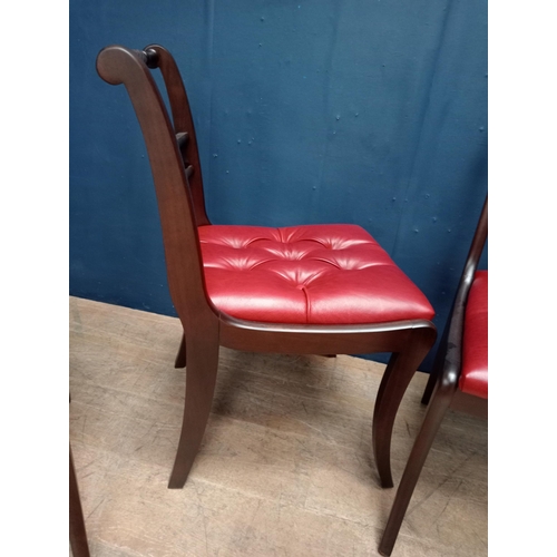 248 - Set of four mahogany rope back side chairs with leather deep button seats in the Regency style {H 82... 