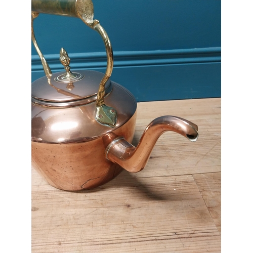 252 - 19th C. copper and brass kettle {28 cm H x 33 cm W x 23 cm D}.