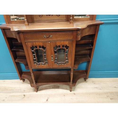 275 - Edwardian carved mahogany chiffoniere with mirrored back raised on turned legs {200 cm H x 123 cm W ... 