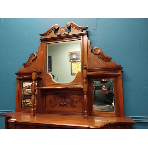 275 - Edwardian carved mahogany chiffoniere with mirrored back raised on turned legs {200 cm H x 123 cm W ... 