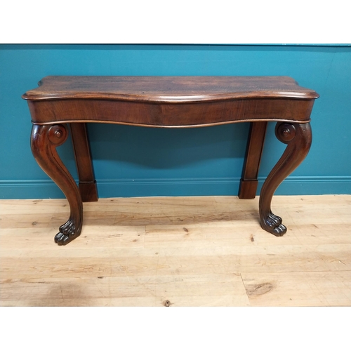 277 - William IV oak serpentine front side table raised on cabriole legs and lions paw feet {80 cm H x 138... 