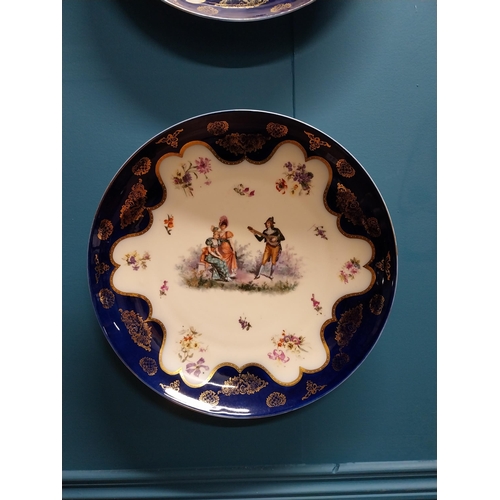 281 - Pair of early 20th C. hand painted Austrian chargers decorated with Musical and Picnic scenes {34 cm... 