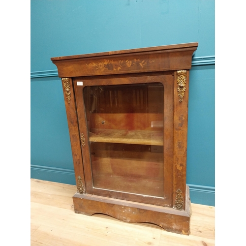 285 - 19th C. French walnut and satinwood inlaid pier cabinet with single glazed door raised on platform b... 