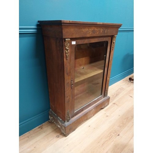 285 - 19th C. French walnut and satinwood inlaid pier cabinet with single glazed door raised on platform b... 