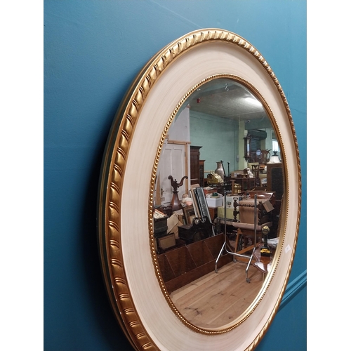 286 - Decorative giltwood and painted circular wall mirror {90 cm Dia.}.