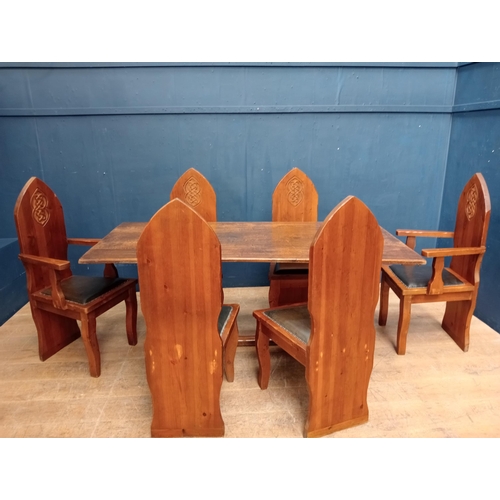 288 - Set of six pine chairs with Celtic carved back and upholstered leather seats in the Gothic style {H ... 