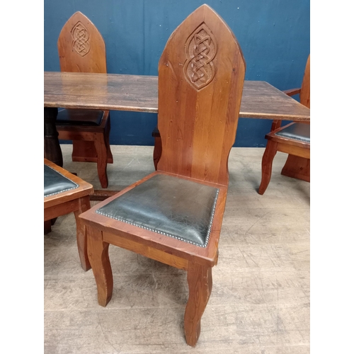 288 - Set of six pine chairs with Celtic carved back and upholstered leather seats in the Gothic style {H ... 